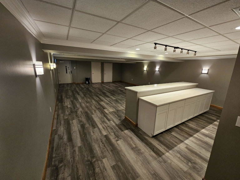 Lower level — wide view showing full lounge and bar area